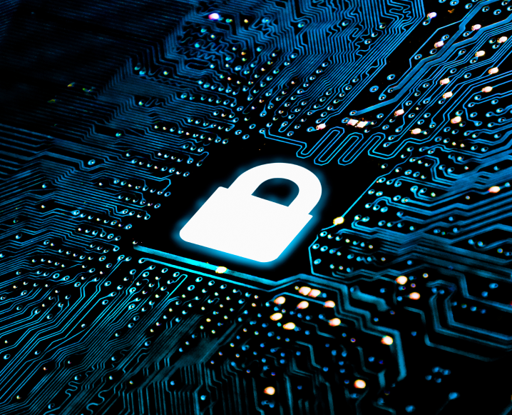 A computer chip on a motherboard, with a lock on it